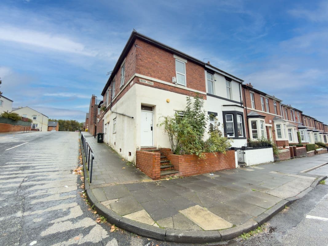 Two Self-Contained Flats — One Freehold Title — £11,700 p.a. Income